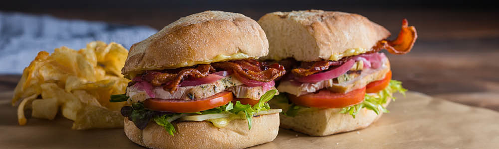 Chicken club sandwich with lettuce, tomato and bacon