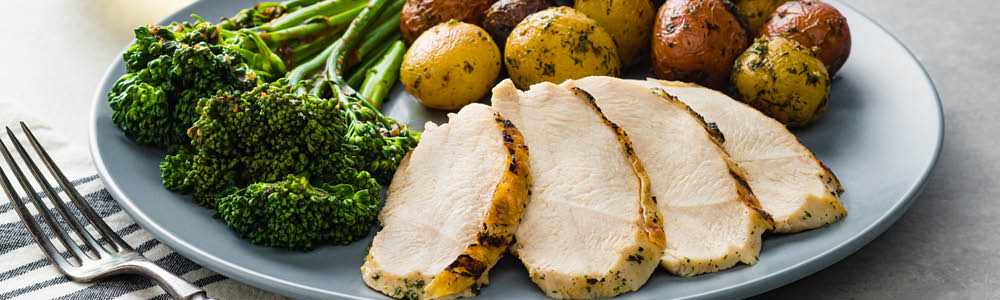 Grilled cage free chicken plate with sides